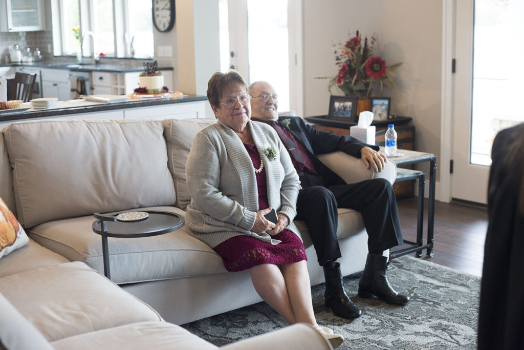 Bride's parents watching the couple exchange wedding vows