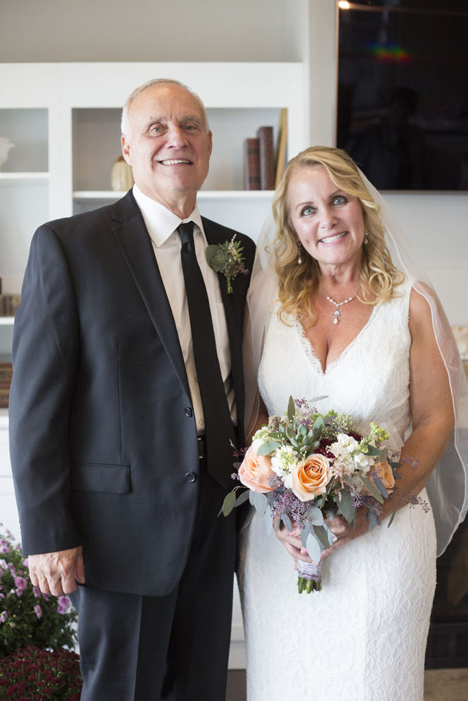 Loren and Mariette pose after their wedding