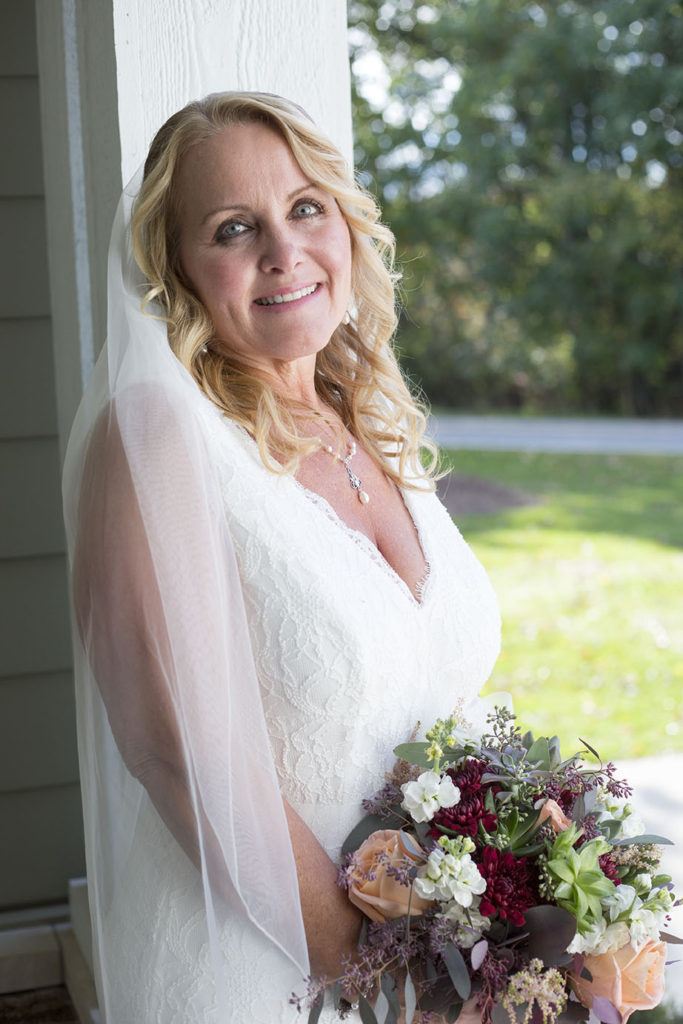 Stunning bride beaming after eloping