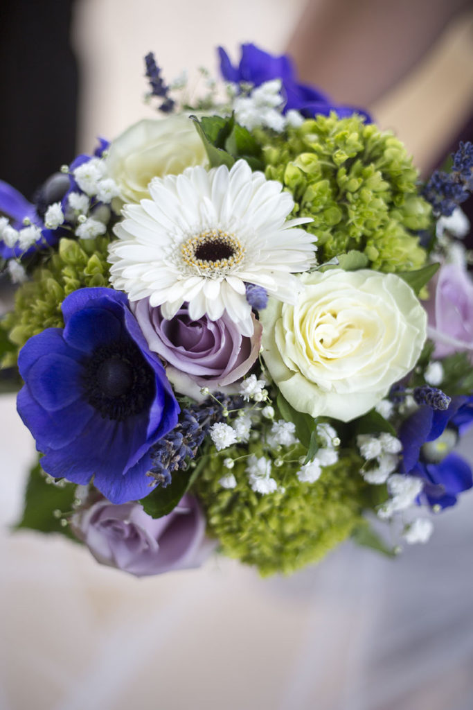 Purple, green, and white wedding bouquet at Detroit wedding