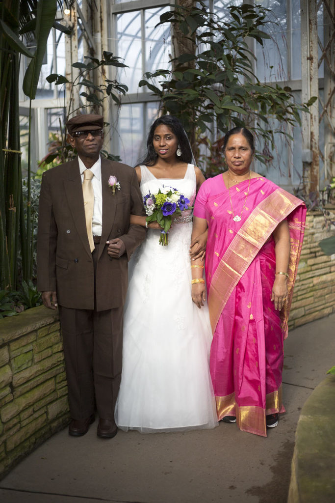 Lavender and her parents from India at their Michigan wedding