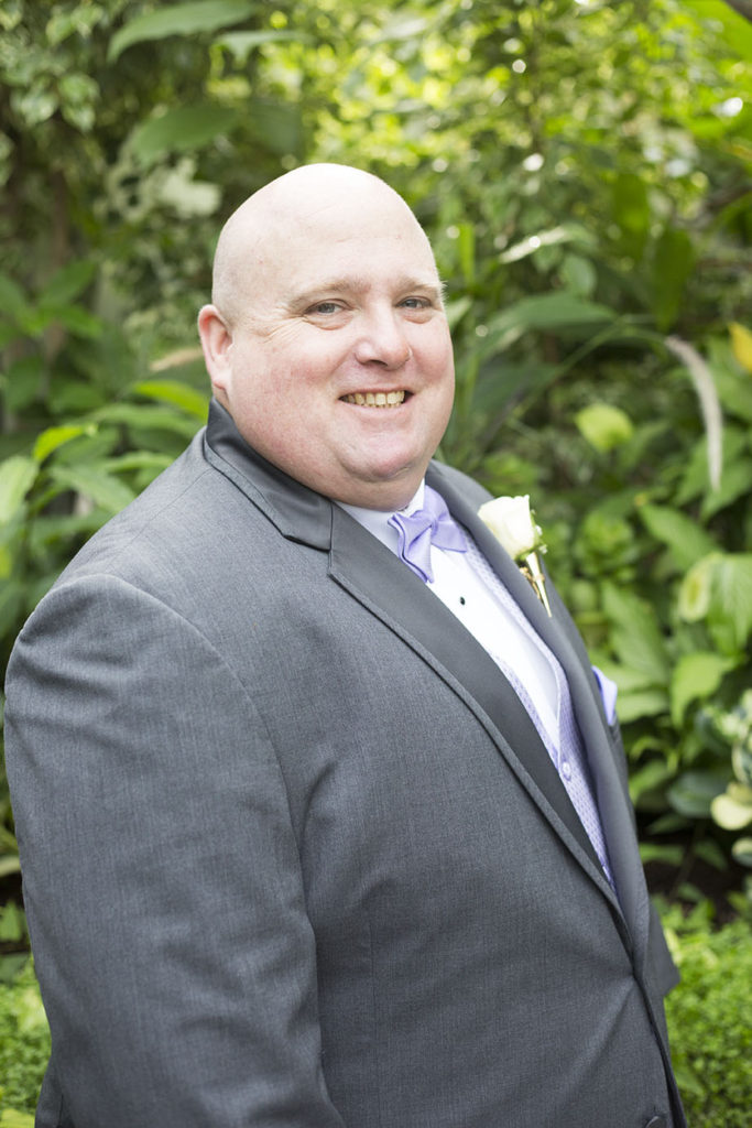 Detroit groom with lavender vest and bowtie