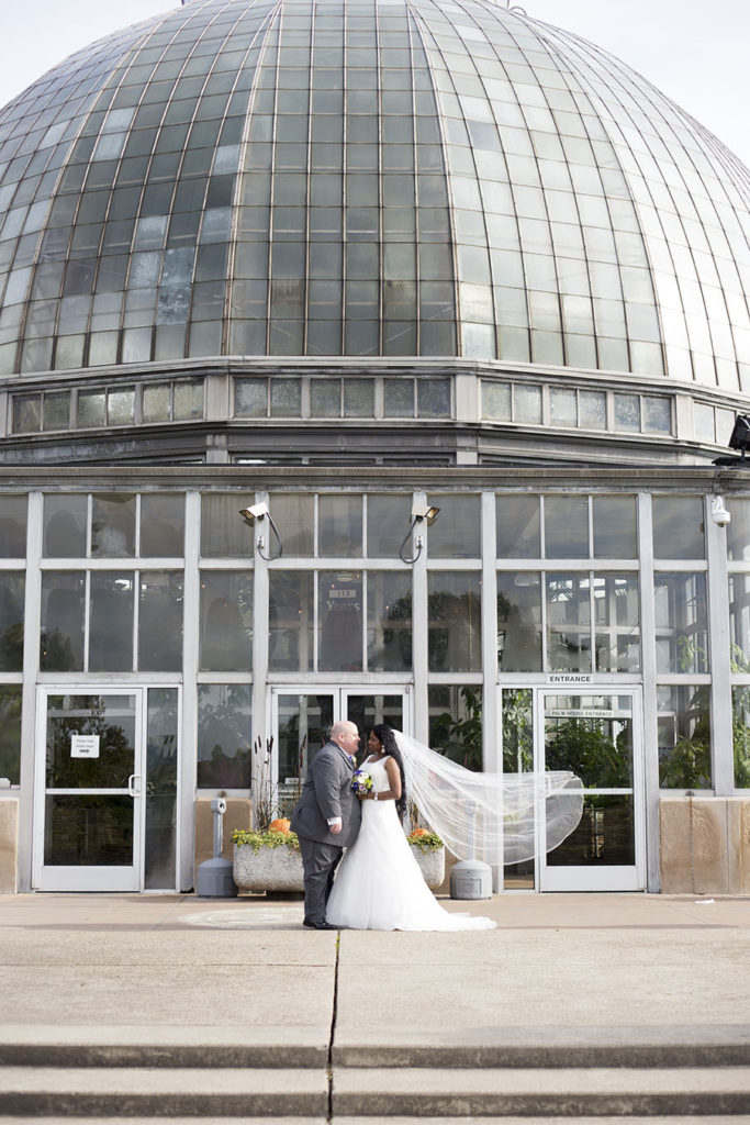 Wedding couple outside of Belle Isle Conservatory