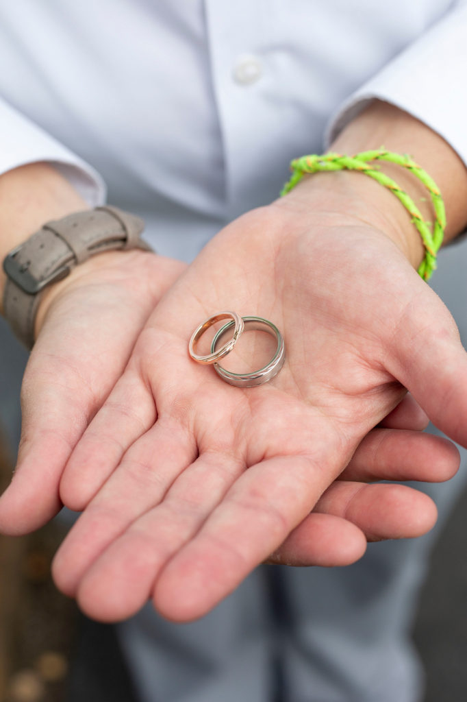 Wedding rings in bride's hands