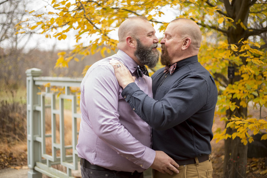 Couple kisses at Matthaei Botanical Gardens