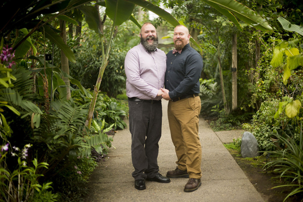 Michigan wedding couple inside the Tropical House at Matthaei Botanical Gardens