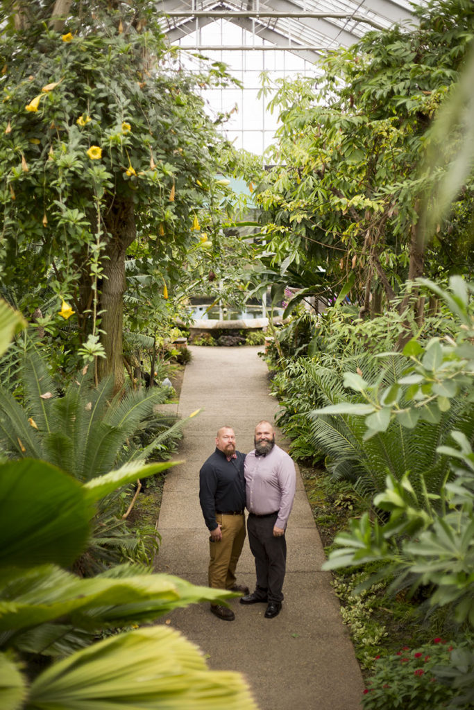 Couple standing hand-in-hand at Matthaei Botanical Gardens elopement