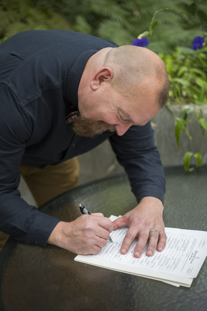 Signing the marriage license