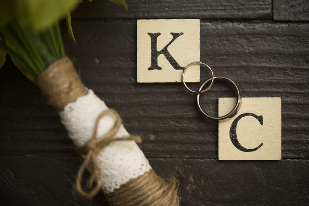 Wedding rings with the antique letter tiles