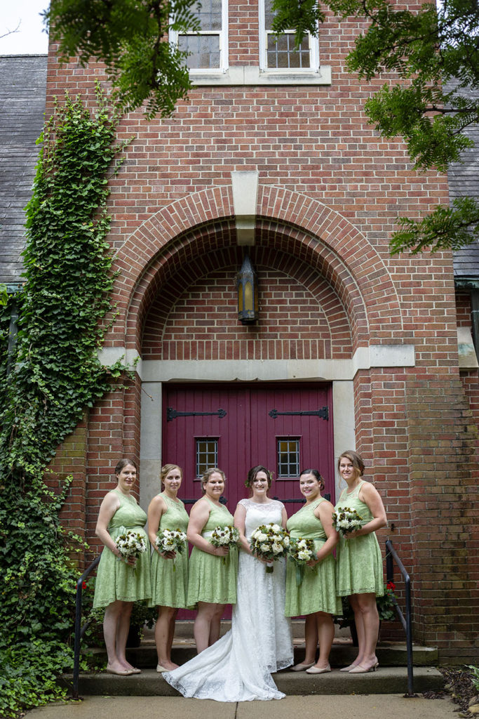 Bridesmaids outside of the church