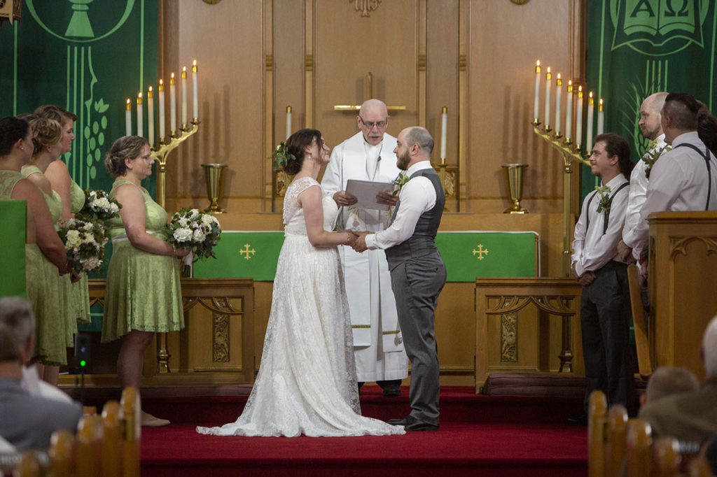 Couple at the altar of their Northville wedding