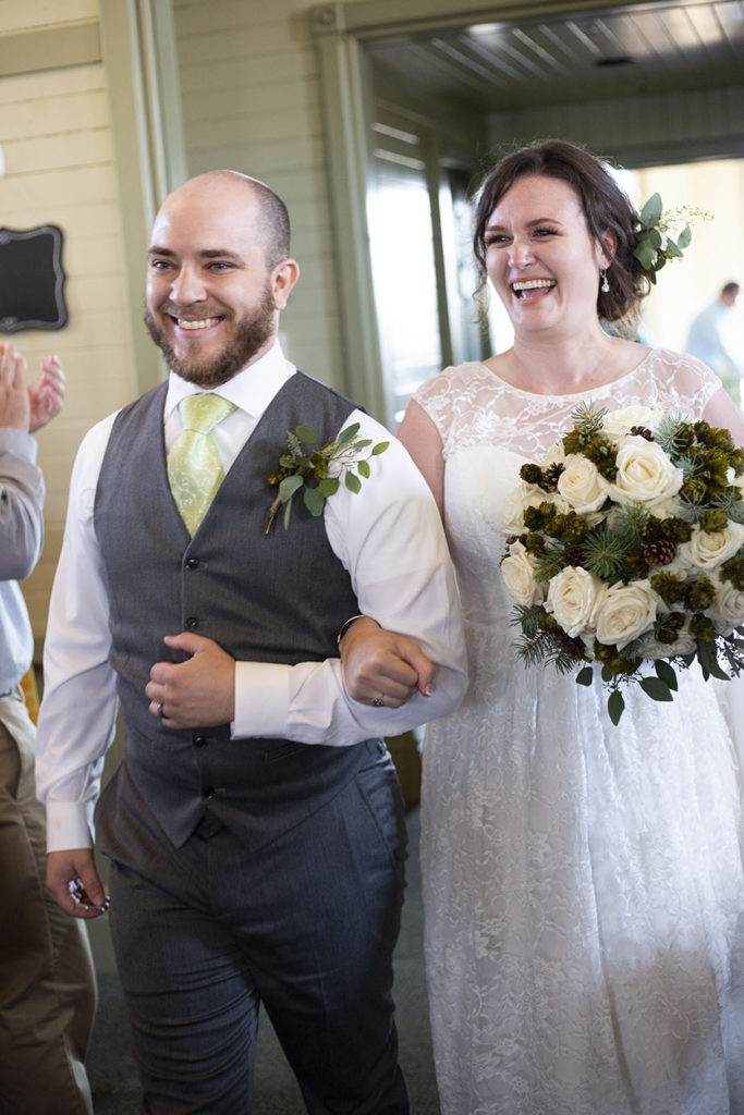 Couple's grand entrance to their wedding reception