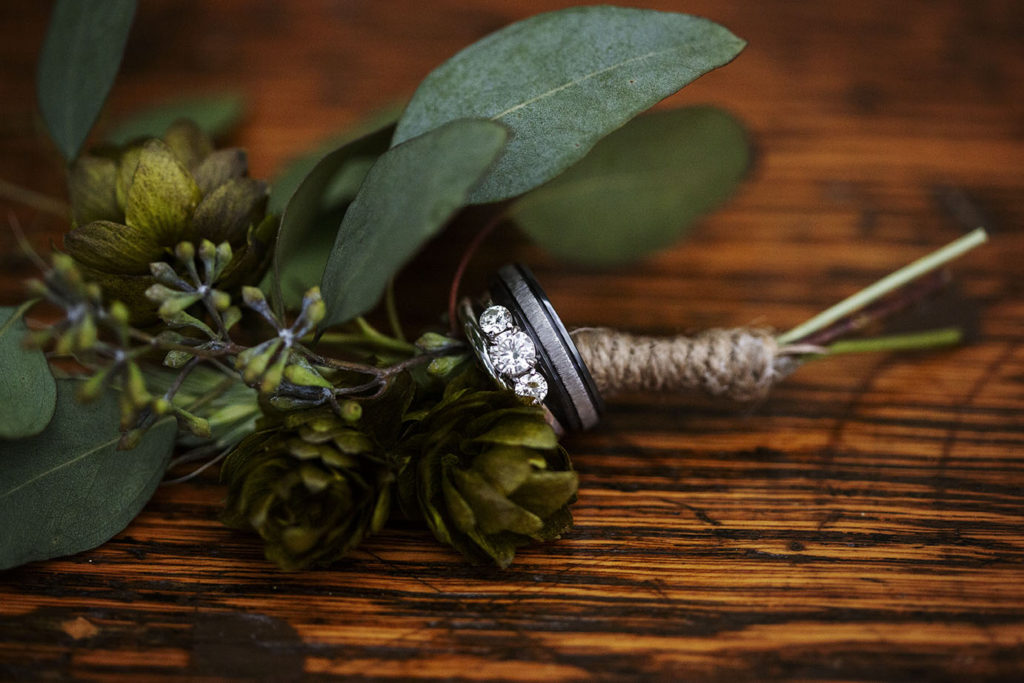 Michigan wedding rings with hopps boutonniere 