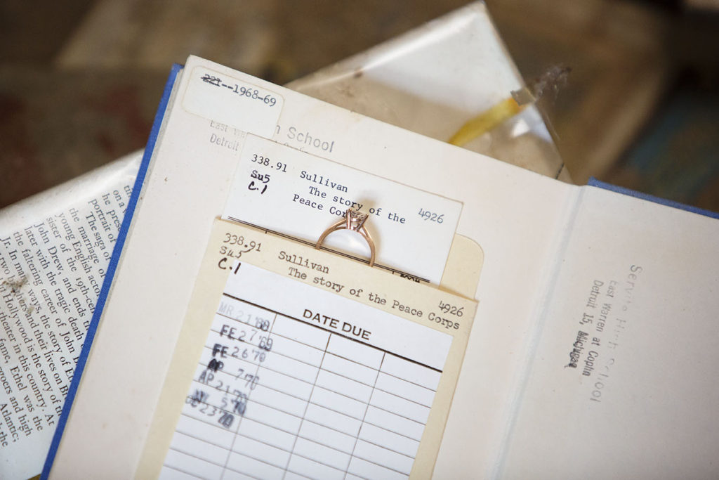 Detroit engagement ring inside an old library book