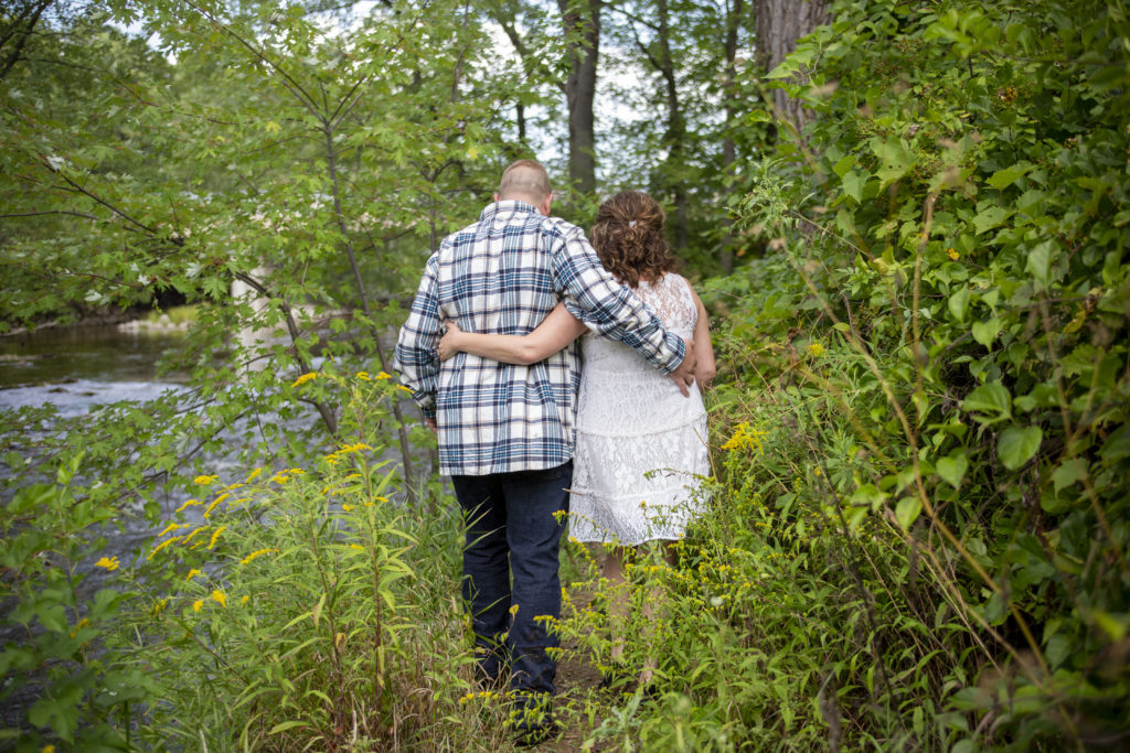 Couple walks side by side for their Dexter engagement session