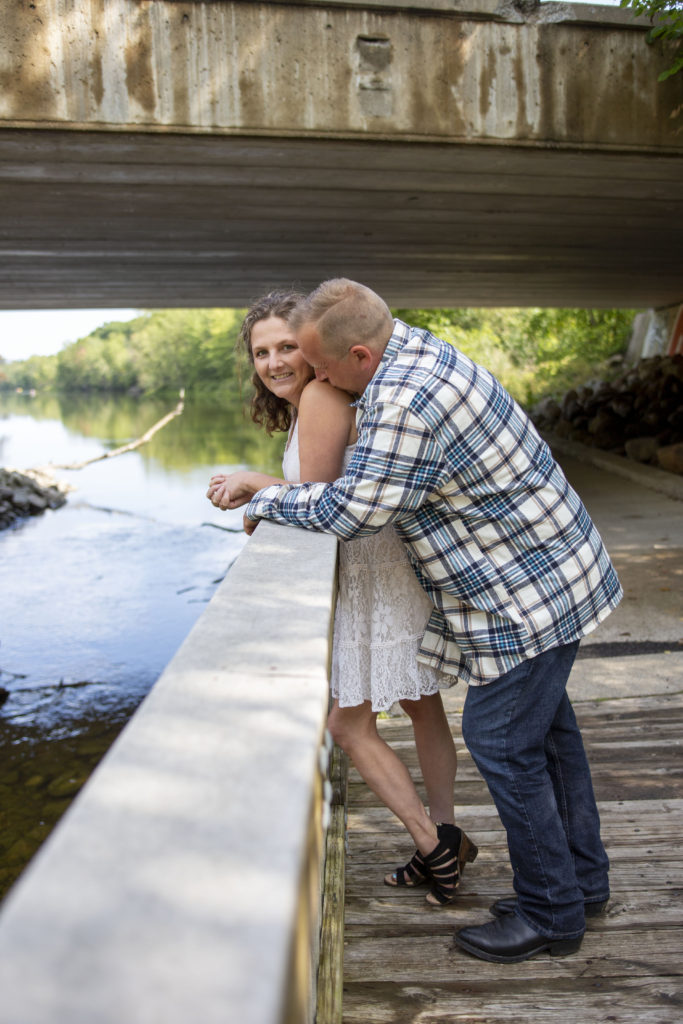 Couple overlooks Huron River in Dexter