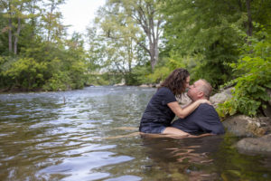 Wide angle of the Huron River and the Michigan engaged couple - how to stay cool during your photo session