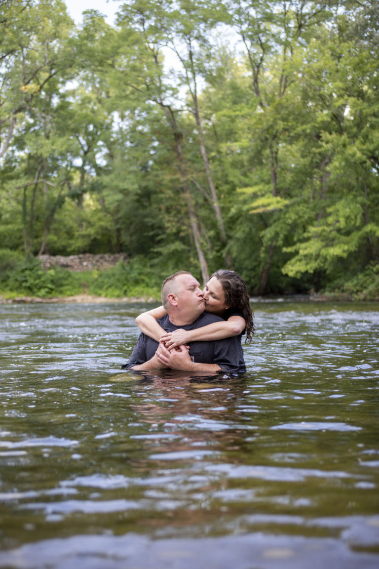 Couple embraces during their Dexter engagement session