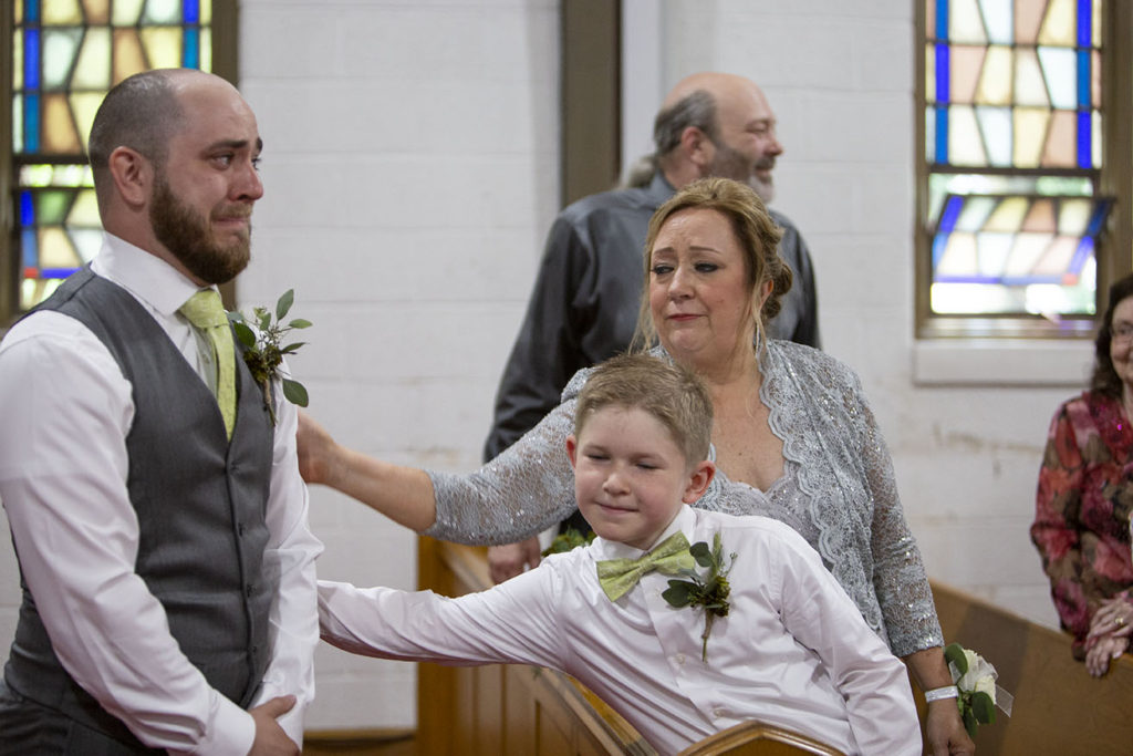 Groom teary eyed as his bride walks down the aisle