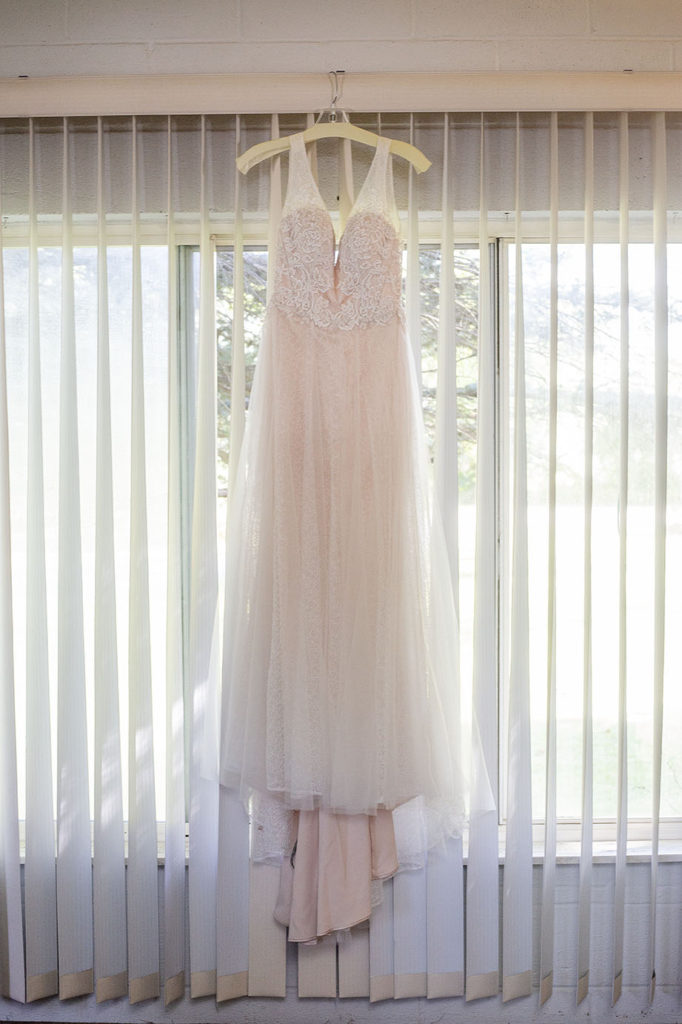 Wedding dress hanging up