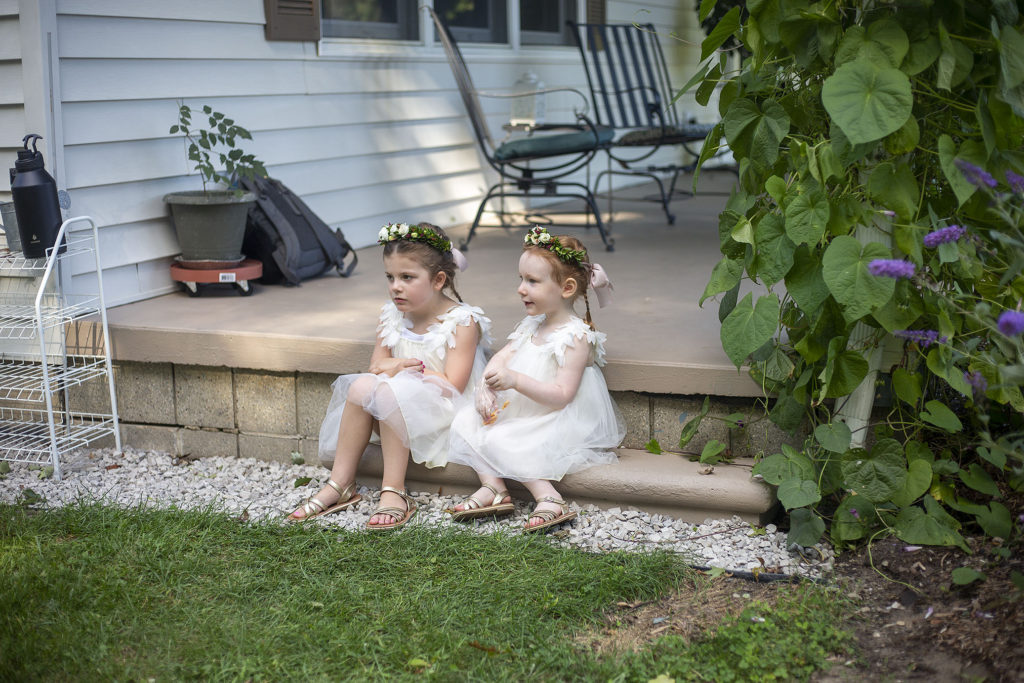 Flower girls waiting before Belleville wedding ceremony