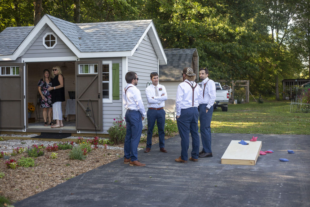 Groomsmen hanging out before the Belleville wedding