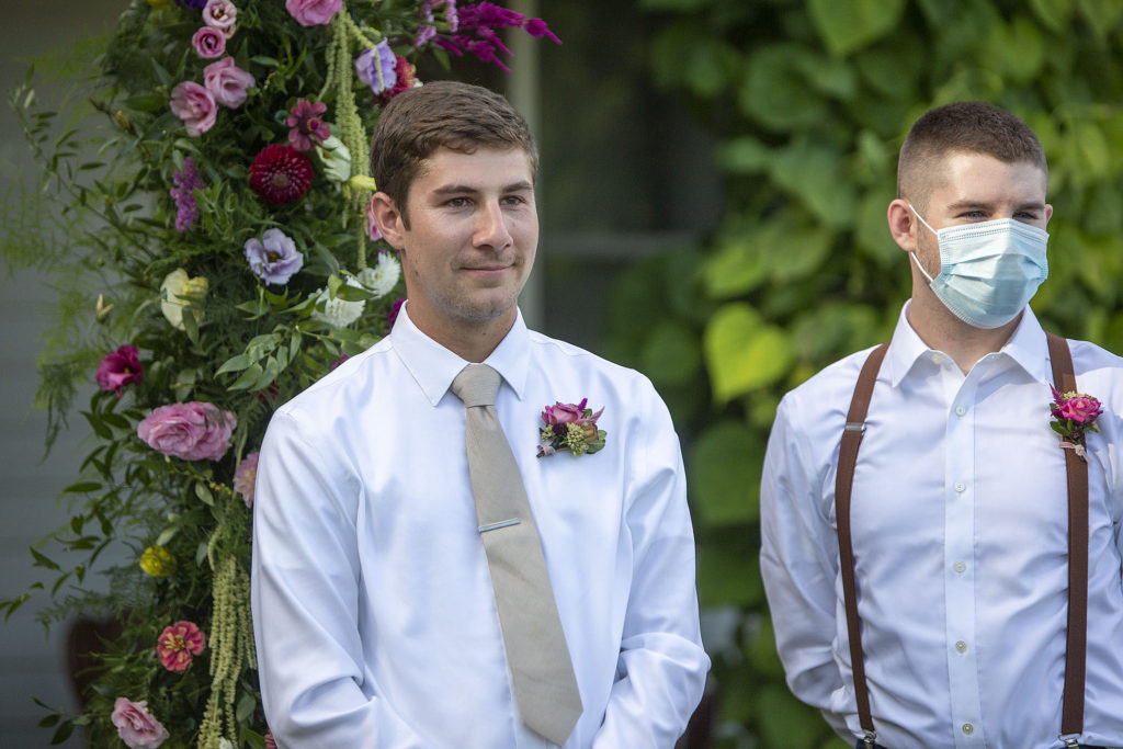 Groom seeing bride for the first time on his wedding day