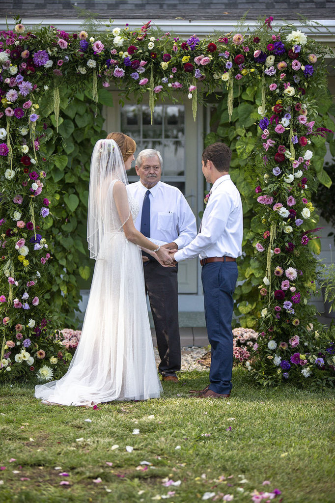 Couple exchanges vows with their uncle officiant