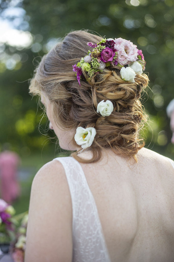 Carmen's floral hairpiece