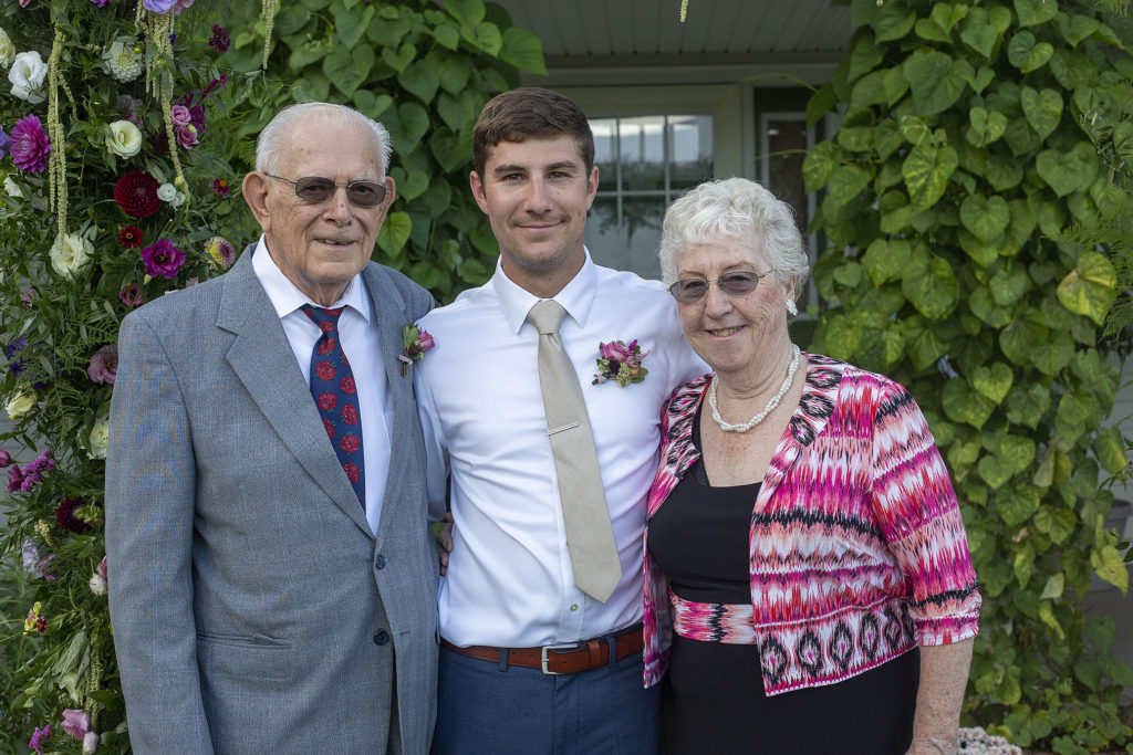 Groom and his grandparents