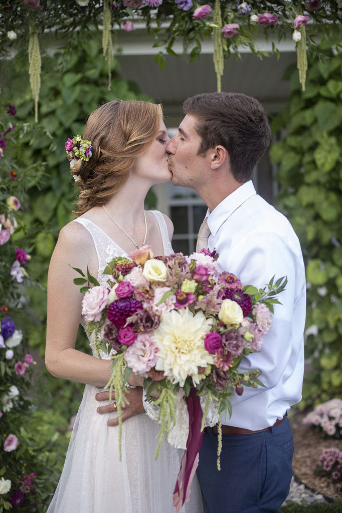 Carmen and Chris kissing