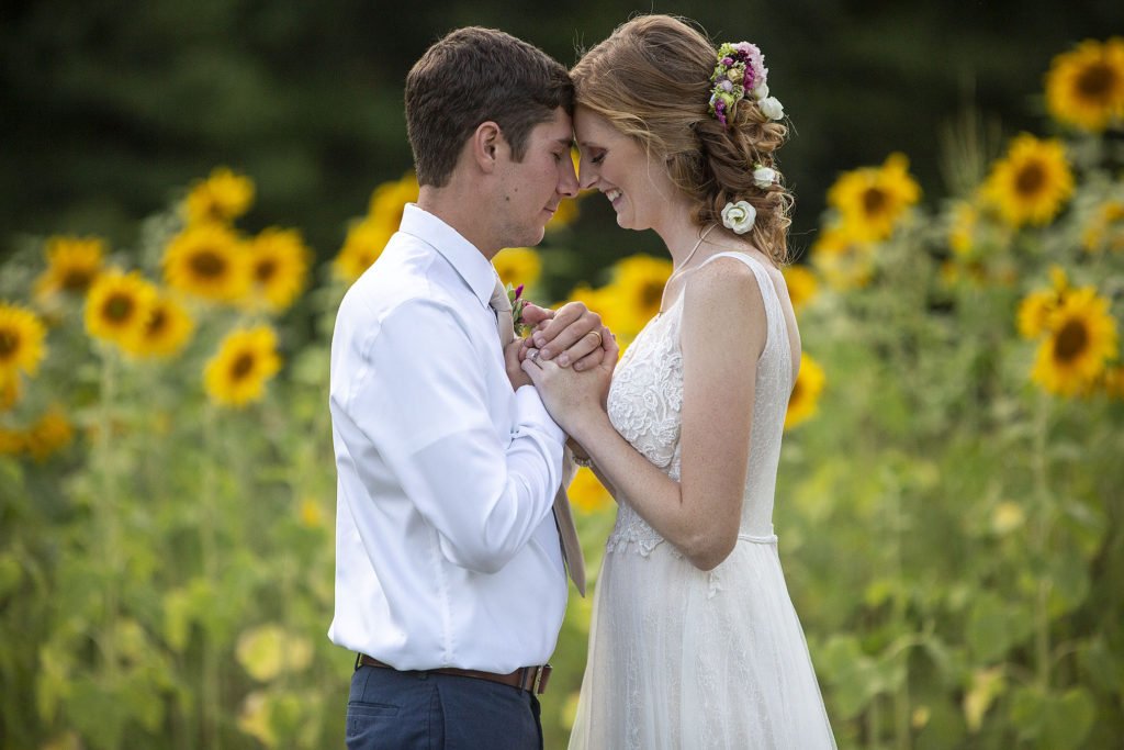 Couple touches foreheads together at their Belleville wedding