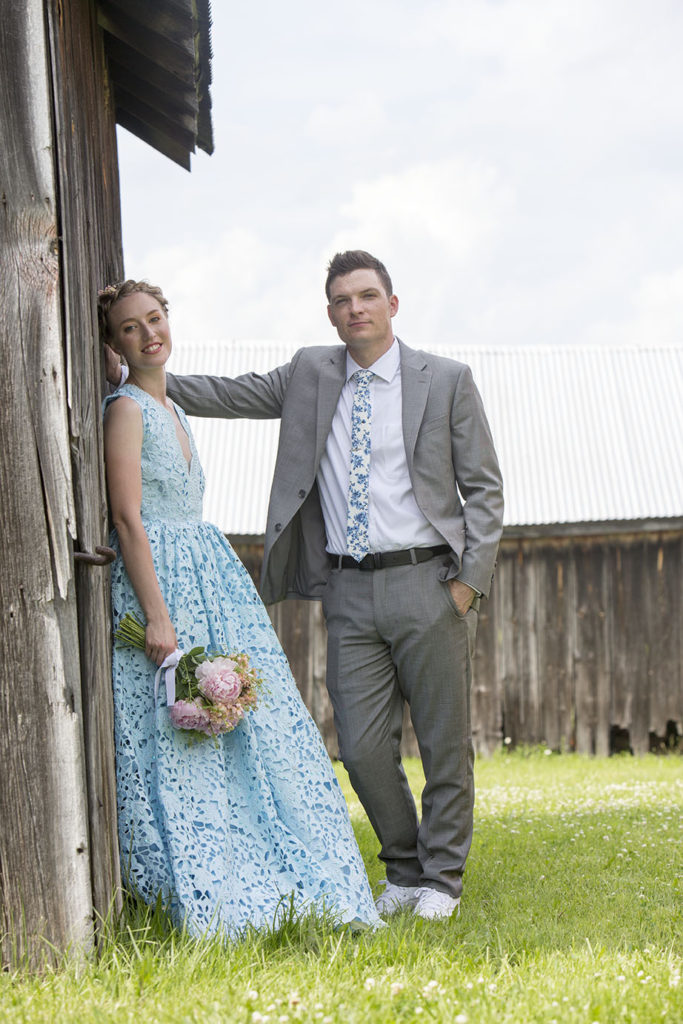 Ypsilanti wedding bride and groom pose near antique barn