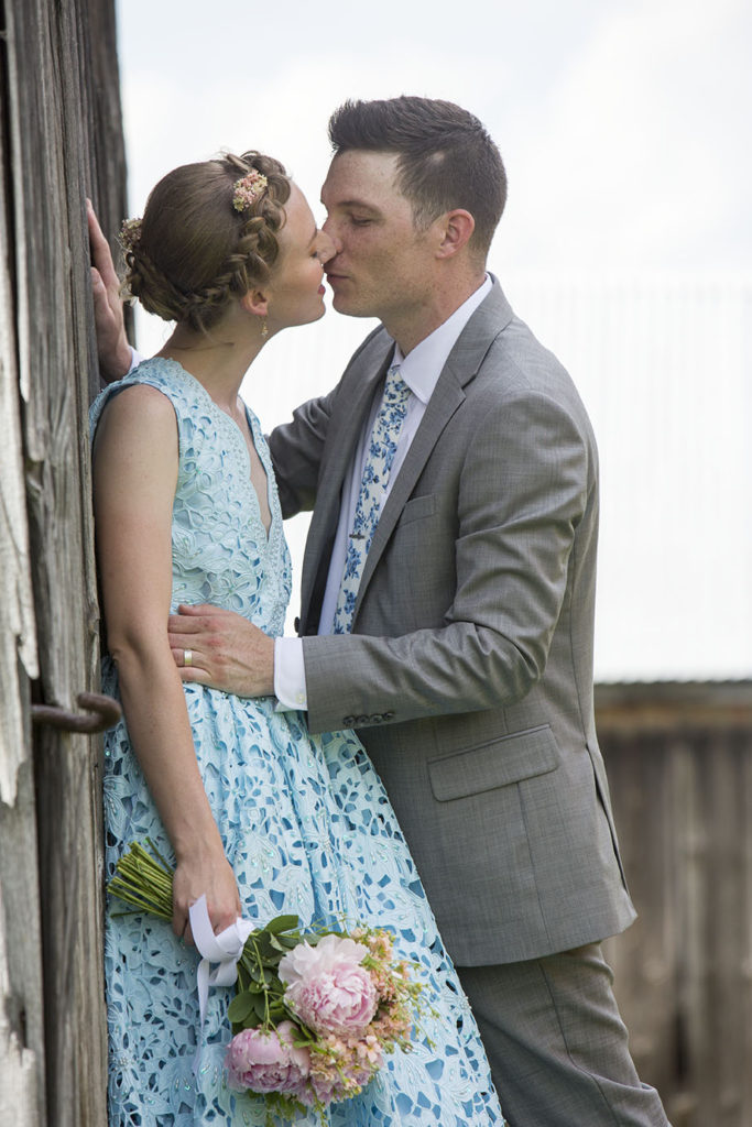 Ypsilanti wedding bride and groom kissing