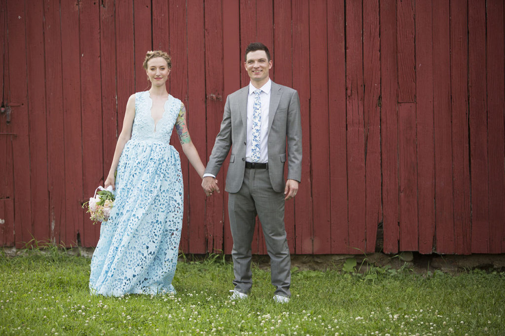 Ypsilanti wedding bride and groom in light blue lace dress and gray tux