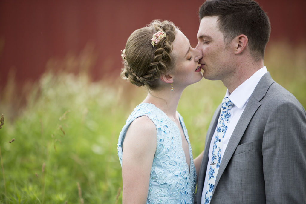 Ypsilanti wedding couple kisses for their Michigan wedding photographer