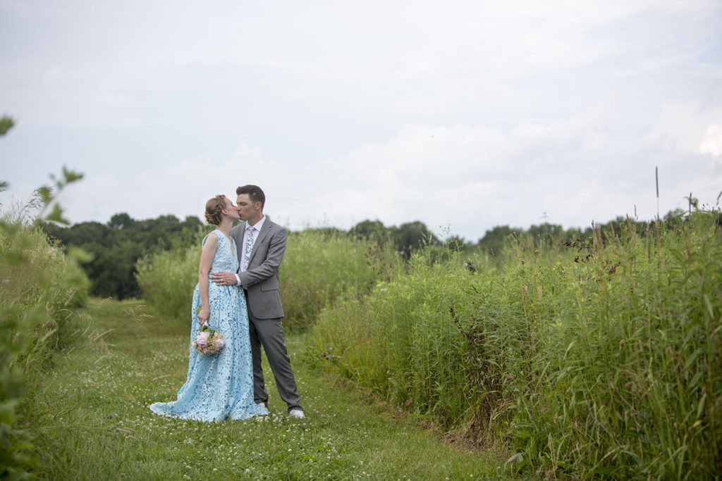 Wide angle image of Ypsilanti wedding couple