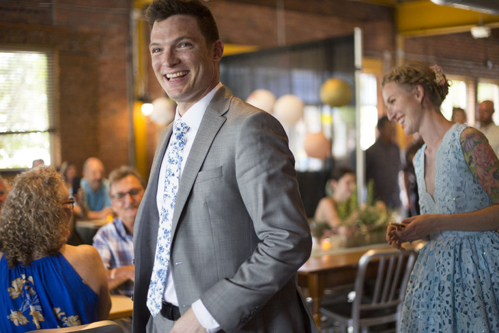 Ypsilanti wedding couple enters reception at Corner Brewery