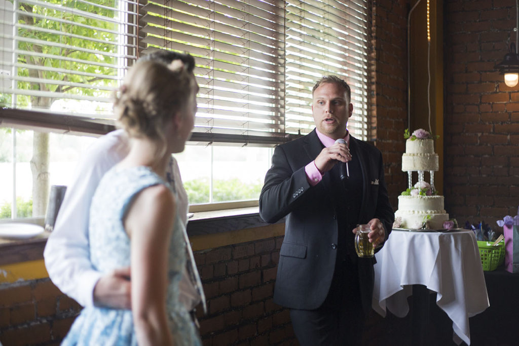 Rachel's brother gives a speech at their Ypsilanti wedding reception