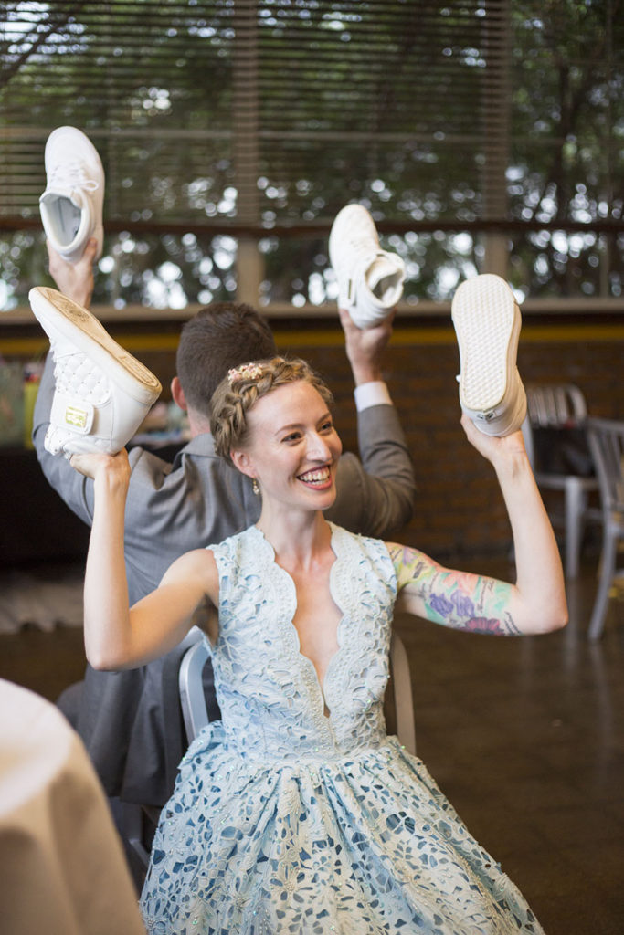 A tie during the shoe game at Ypsilanti wedding reception