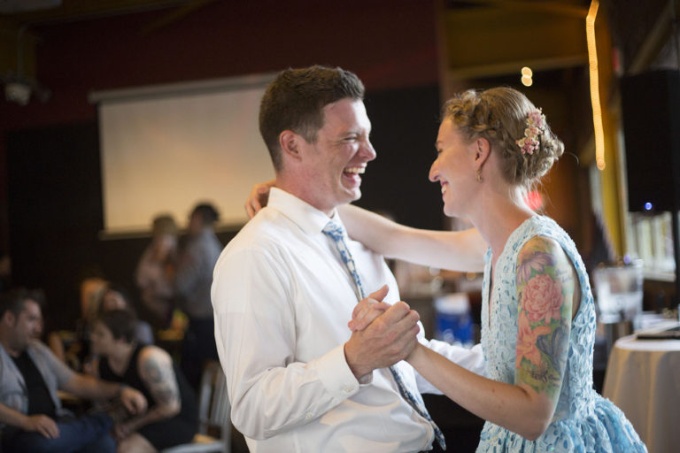 Groom cracking up during Ypsilanti wedding first dance