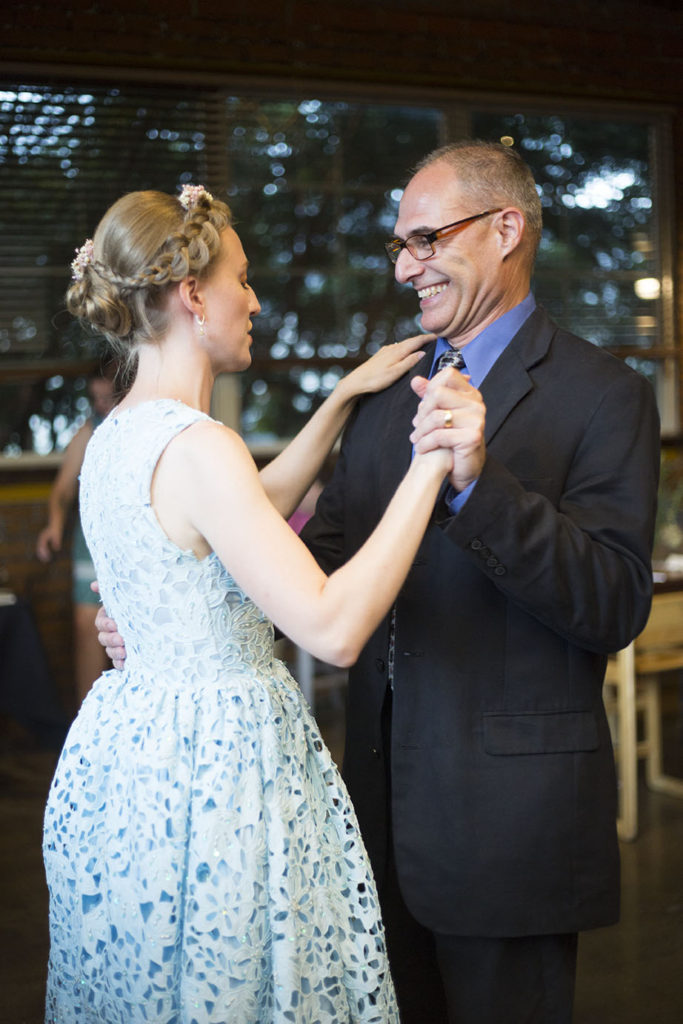 Father proudly smiles at daughter Ypsilanti wedding