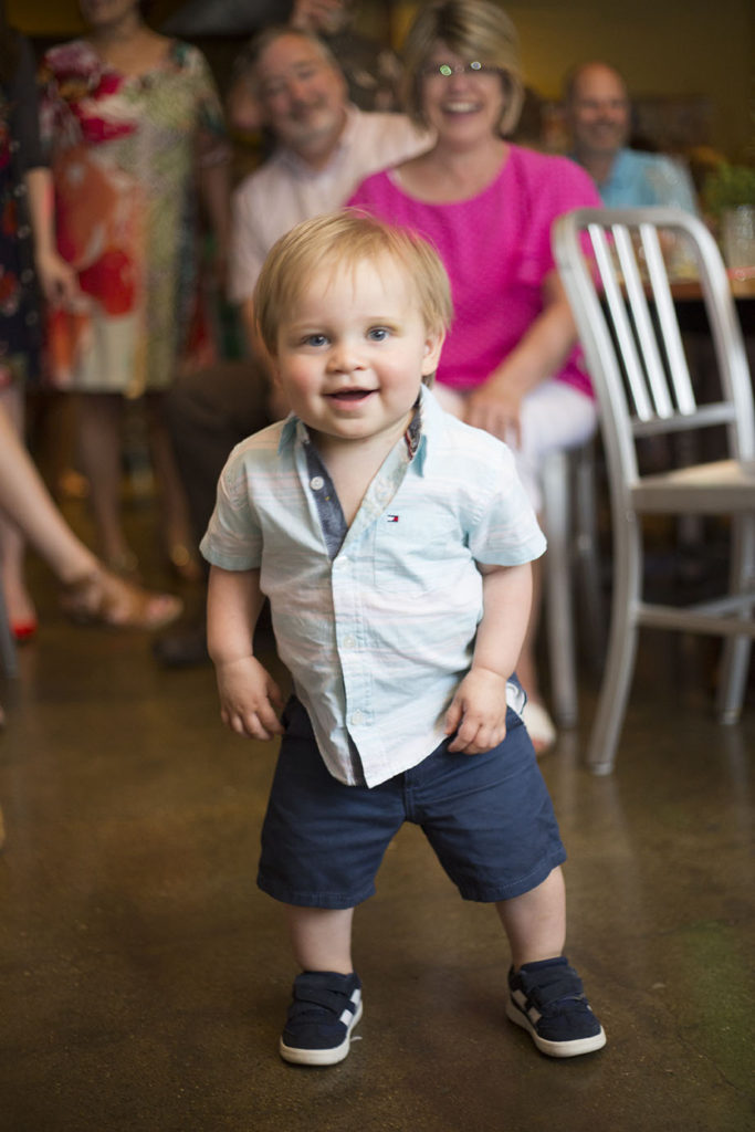 Little boy dances at Ypsilanti wedding reception