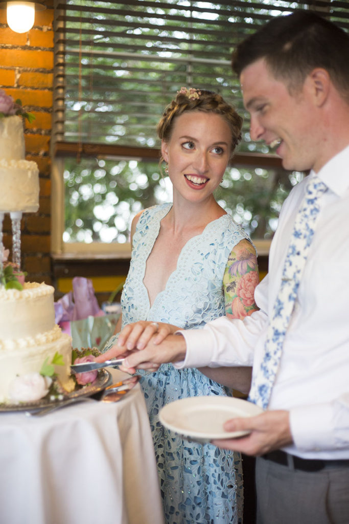 Rachel looks at Wade during their cake cutting