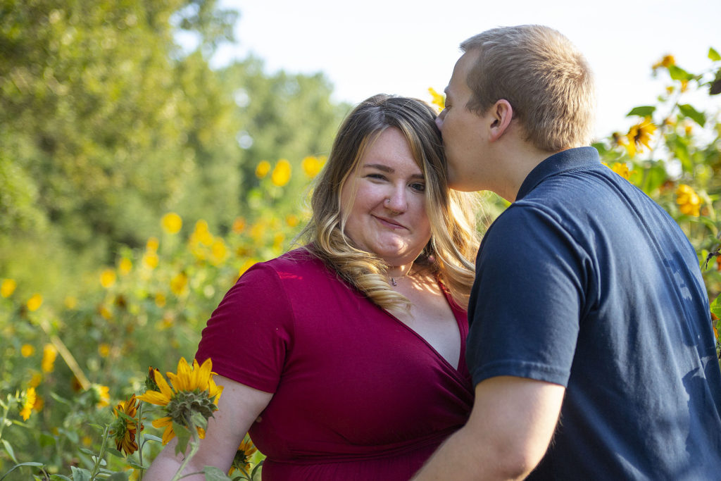 Pinckney couples session in the sunflower field