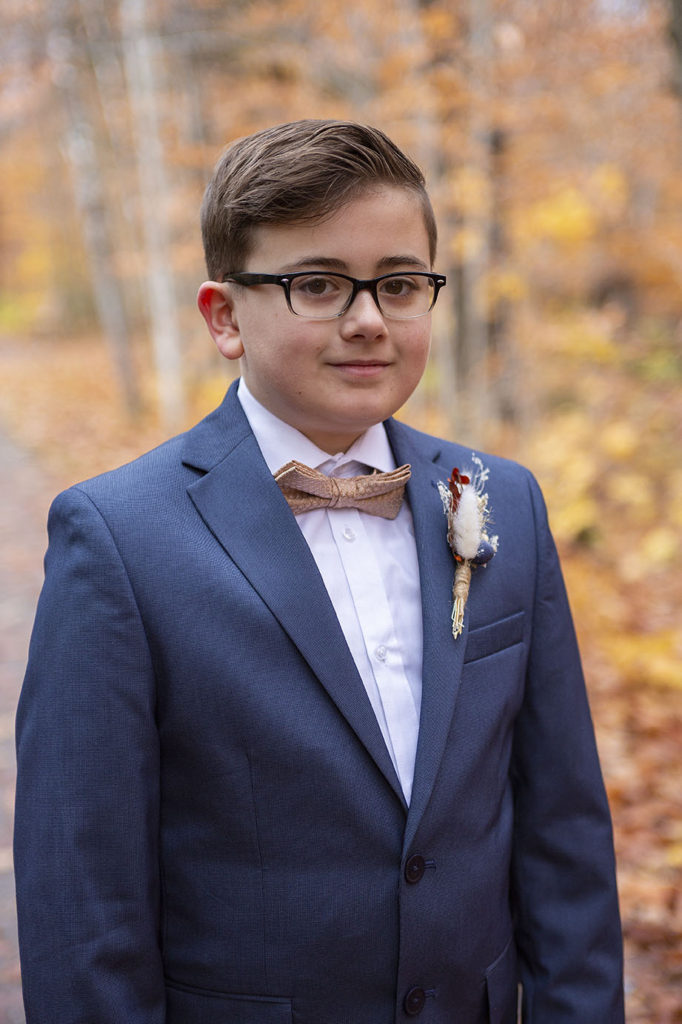 Michigan ring bearer at Tahquamenon Falls elopement