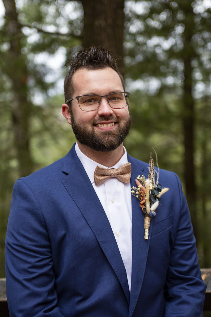 Tahquamenon Falls elopement, groom