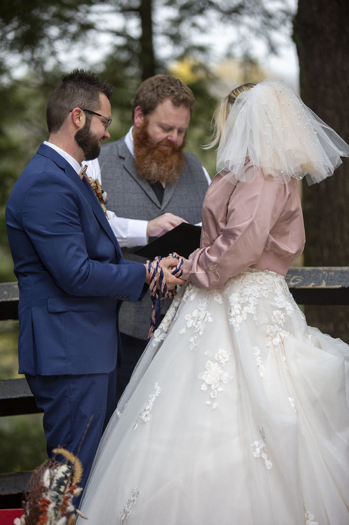 Northern Michigan hand fasting ceremony Tahquamenon Falls elopement