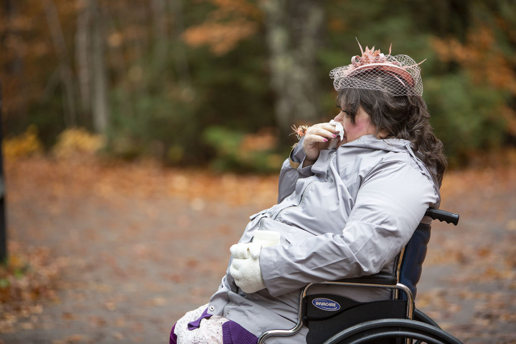 Mom cries into tissue at Tahquamenon Falls elopement