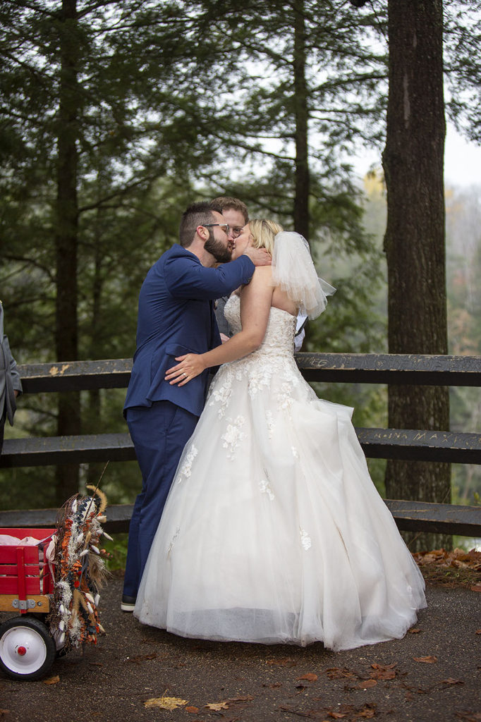 First kiss at Tahquamenon Falls elopement